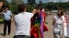 An anti-gay protester (front) clashes with a gay rights activist during a Gay Pride event in St. Petersburg, Russia, in this June 29, 2013, file photo.