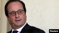 A poll indicates French people overwhelmingly support a decision by French President Francois Hollande’s government to strip dual citizens of their French nationality in terrorism cases. He’s shown at the Elysee Palace in Paris, Dec. 23, 2015.