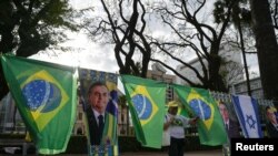 Un partidario del presidente y candidato a la reelección de Brasil, Jair Bolsonaro, llega a un acto de campaña en Belo Horizonte, Brasil, el 24 de agosto de 2022.