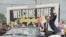 FILE - In this June 22, 1992 file photo, former hostage Terry Anderson waves to the crowd as he rides in a parade in his honor in Lorain, Ohio. 