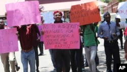 A group of government workers protest for better salaries in Harare, Zimbabwe, Nov. 6, 2019.