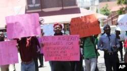 A group of government workers protest for better salaries in Harare, Zimbabwe, Nov. 6, 2019.