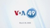 VOA60 America - President Trump says social distancing will need to continue through April