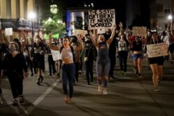 Demonstrators marching near the BOK Center where President Trump was holding a campaign rally in Tulsa, Okla., June 20, 2020.