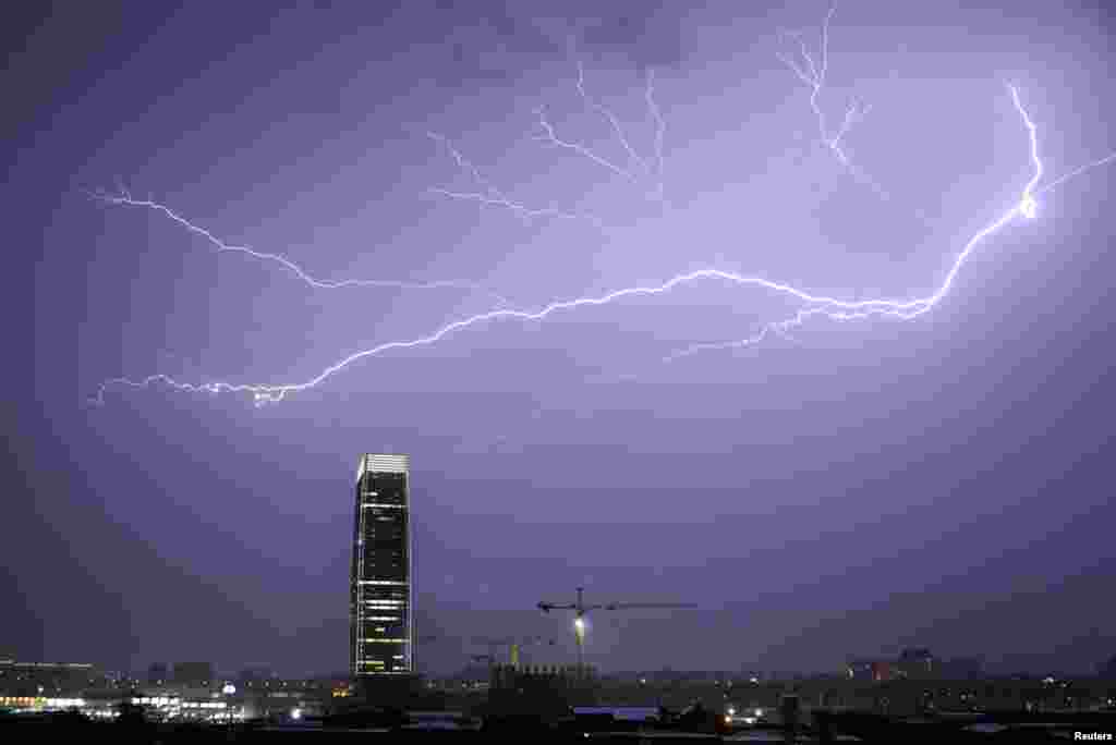 Lightening strikes across the sky during a thunderstorm in Guangzhou, Guangdong province, China, May 17, 2014.