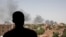 FILE - Smoke is seen in Khartoum, Sudan, Saturday, April 22, 2023. 