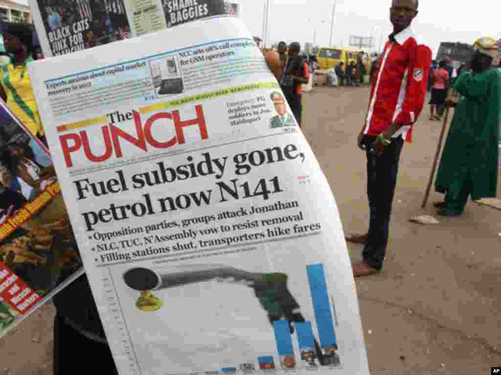 A Nigerian newspaper with a headline about rising fuel prices. (Reuters)