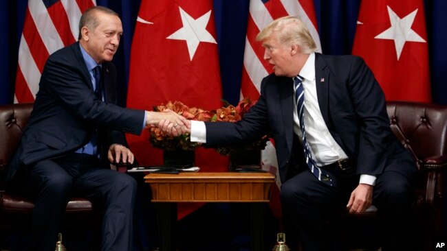 U.S. President Donald Trump shakes hands with Turkish President Recep Tayyip Erdogan during a meeting at the Palace Hotel during the United Nations General Assembly in New York, Sept. 21, 2017.