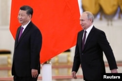 俄罗斯总统普京2019年6月5日在莫斯科克里姆林宫会见到访的中国国家主席习近平。