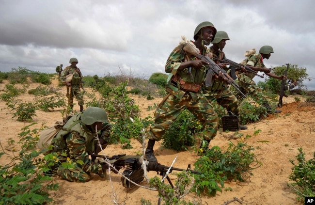 FILE - African Union peacekeepers are seen in the Deynile district of the capital Mogadishu, Somalia. Oct. 20, 2011.