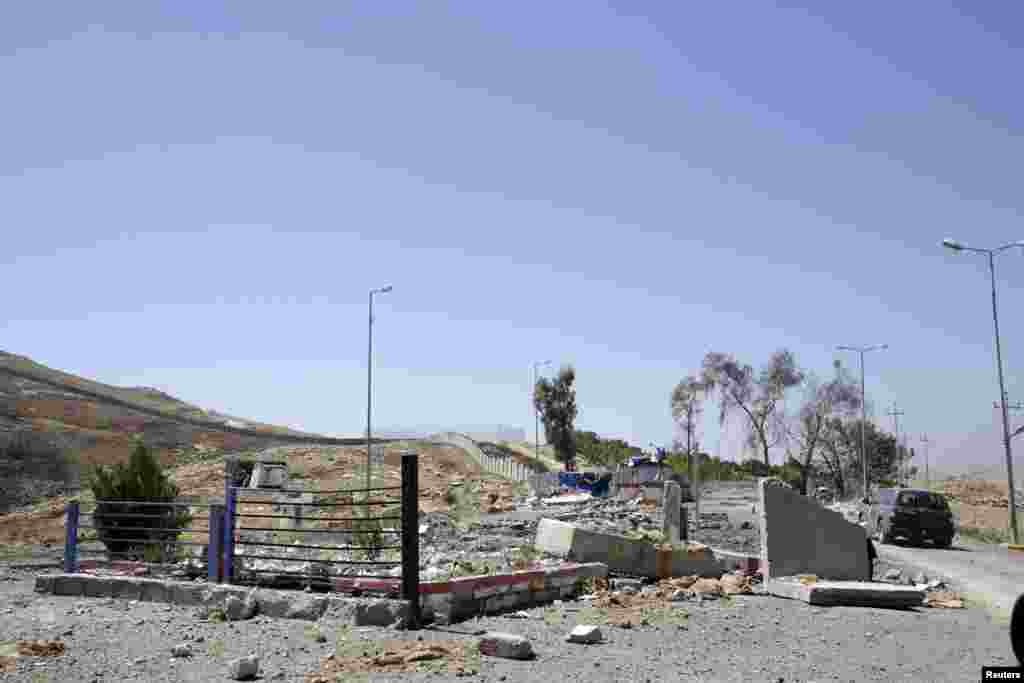 A checkpoint destroyed by a U.S. air strike near Mosul Dam, northern Iraq, Aug. 21, 2014.