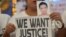 A woman displays a picture of her son, a drug war victim, and a placard during a protest against the war on drugs by President Rodrigo Duterte in Quezon city, Metro Manila in Philippines, Aug. 28, 2018. 