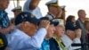 FILE - Pearl Harbor survivors, from left, Harry Chandler, Ken Stevens, Herb Elfring and Ira "Ike" Schab salute while the national anthem is played during the 82nd Pearl Harbor Remembrance Day ceremony on Dec. 7, 2023, at Pearl Harbor in Honolulu, Hawaii.