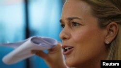 Human rights activist Lilian Tintori, wife of opposition leader Leopoldo Lopez, speaks during a news conference in Caracas, Venezuela, Sept. 2, 2017. Tintori said she had been barred from flying out of the country to go to France and other EU capitals.