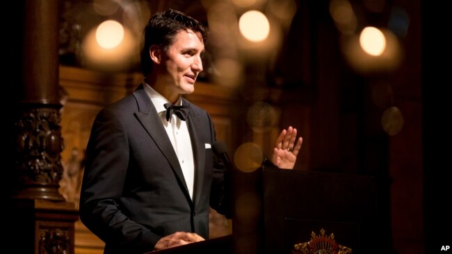 FILE - Canadian Prime Minister Justin Trudeau speaks in Hamburg, Germany, Feb. 17, 2017. Trudeau and Ivanka Trump attending a Broadway musical about how Canada helped thousands stranded after September 11.