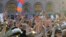 Supporters of opposition lawmaker Nikol Pashinian protest in Republic Square in Yerevan on Wednesday, May 2, 2018. Pashinyan has urged his supporters to block roads, railway stations and airports on Wednesday after the governing Republican Party voted against his election as prime minister.