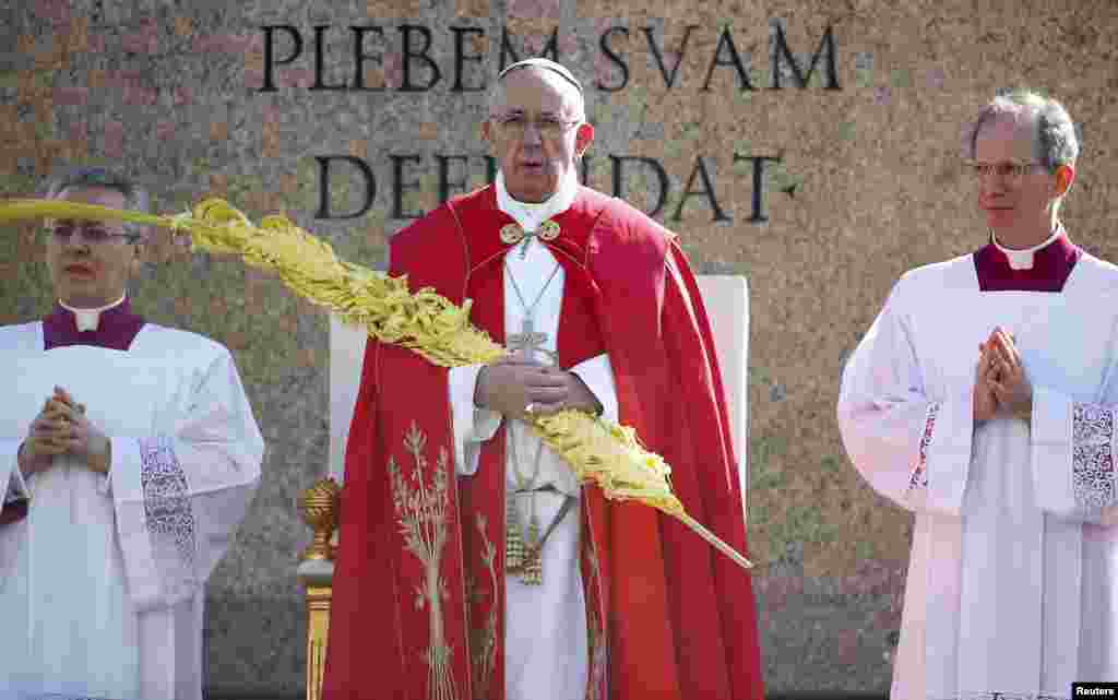 Pope Francis leads the Palm Sunday Mass at Saint Peter&#39;s Square at the Vatican.