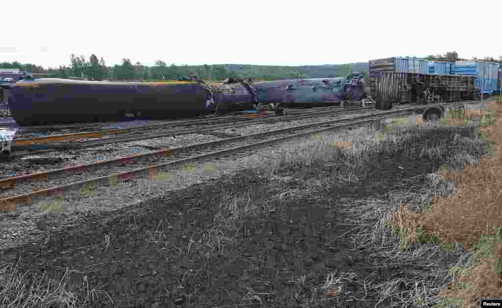 Wagons of the train wreck are seen in Lac Megantic, Quebec, Canada, July 9, 2013. 