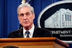 Special counsel Robert Mueller speaks at the Department of Justice Wednesday, May 29, 2019, in Washington.