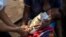 Un enfant est vacciné au Kasaï en RDC, le 23 décembre 2017. (Twitter/Unicef RDC) 