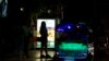 Sex workers stand in a largely shut-down red light area in Bangkok, Thailand, Thursday, March 26, 2020. A month-long state of emergency has been enforced in Thailand to allow its government to impose stricter measures to control the coronavirus that…