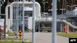 FILE - Facilities to receive and distribute natural gas are pictured on the grounds of gas transport and pipeline network operator Gascade in Lubmin, Germany, Aug. 30, 2022. Moscow on Sept. 2 delayed the reopening of its main gas pipeline to Germany, blam