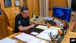 The head of Ukraine's powerful National Security and Defense Council, Oleksiy Danilov, speaks to The Associated Press at his office in Kyiv, Ukraine, Sept. 2, 2022. 