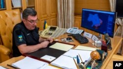 The head of Ukraine's powerful National Security Council, Oleksiy Danilov, speaks to The Associated Press at his office in Kyiv, Ukraine, Sept. 2, 2022. 