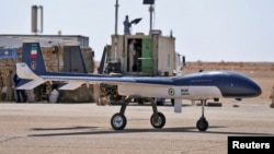 FILE - A view of a drone during a military exercise in an undisclosed location in Iran, in this handout image by Iranian Army/WANA (West Asia News Agency) obtained on Aug. 24, 2022.