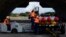 FILE - Military personnel prepare to load Harpoon A-84 anti-ship missiles on a F16V fighter jet at the Hualien Airbase in Taiwan's southeastern Hualien county, Aug. 17, 2022.