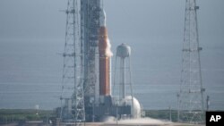 NASA's new moon rocket sits on Launch Pad 39-B hours ahead of a planned launch at the Kennedy Space Center, Sept. 3, 2022, in Cape Canaveral, Fla.