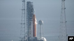 NASA's new moon rocket sits on Launch Pad 39-B hours ahead of a planned launch at the Kennedy Space Center, Sept. 3, 2022, in Cape Canaveral, Fla. 