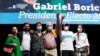 El presidente electo de Chile, Gabriel Boric, celebra junto a su novia, sus padres y hermanos tras ganar las elecciones presidenciales, el 19 de diciembre de 2021.