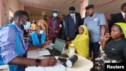 Refugees from the Central African Republic get their digital IDs at the Gado-Badzere camp in Cameroon. June 26, 2022. 