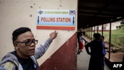 Election officials from the eSwatini Elections and Boundaries Commission set up a polling station on the eve of eSwatini parliamentary elections on Sept. 20, 2018 at Betheny Mission Primary school in Lobamba Lomdzala.