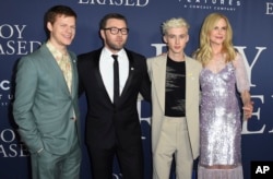 Lucas Hedges, from left, Joel Edgerton, Troye Sivan and Nicole Kidman arrive at the Los Angeles premiere of "Boy Erased," Oct. 29, 2018, at the Directors Guild of America.