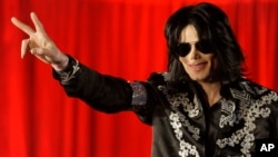 FILE - Michael Jackson at a press conference at London's O2 Arena, March 5, 2009. 