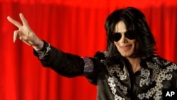 In this March 5, 2009 file photo Michael Jackson announces that he is set to play ten live concerts at the London O2 Arena in July, which he announced at a press conference at the London O2 Arena.