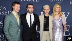 FILE - From left, Lucas Hedges, Joel Edgerton, Troye Sivan and Nicole Kidman arrive at the Los Angeles premiere of "Boy Erased," Oct. 29, 2018, at the Directors Guild of America. The movie has given momentum to the drive to ban gay conversion therapy for minors.