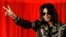 In this March 5, 2009 file photo Michael Jackson announces that he is set to play ten live concerts at the London O2 Arena in July, which he announced at a press conference at the London O2 Arena. 