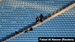 FILE - Saudi Arabia women attend a rally to celebrate the 87th annual National Day of Saudi Arabia in Riyadh, Saudi Arabia, Sept. 23, 2017. 