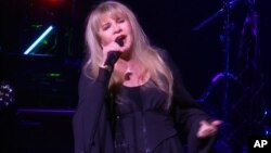 This image made from video shows singer Stevie Nicks singing "Rhiannon" during a surprise performance after the curtain call for the musical "School of Rock," April 26, 2016, in New York. 