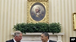 President Barack Obama (r) meets with Britain's Prince Charles in the Oval Office of the White House, May 4, 2011