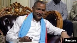 FILE - Democratic Republic of Congo's opposition Presidential candidate Moise Katumbi talks to his supporters after leaving the prosecutor's office in Lubumbashi, the capital of Katanga province of the Democratic Republic of Congo, May 11, 2016. 