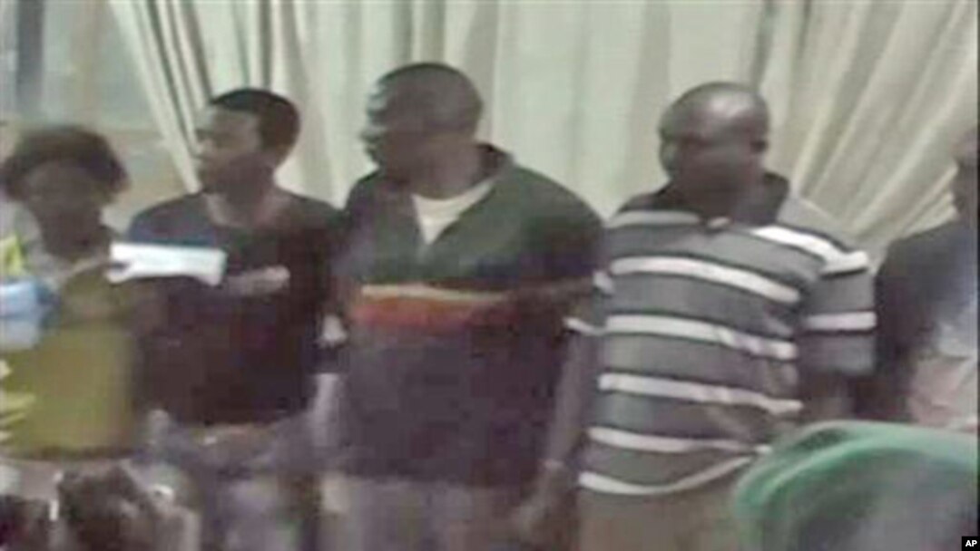 Suspected kidnappers of Michael Obi, the kidnapped father of Chelsea midfielder John Obi Mikel, are paraded in Kano. Michael Obi, who was kidnapped on Aug. 12 while on his way home from work in the central Nigerian city of Jos, was freed Monday after dete