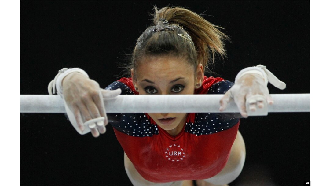 FILE - In this Oct. 17, 2010, photo, Mattie Larson of the U.S. performs on the uneven bars. Larson, who was molested by Larry Nassar and was among the nearly 250 who gave victim impact statements during his sentencing, said the doctor cleared her one time to train at the Bela and Martha Karolyi complex in Texas on an ankle that turned out to be fractured.