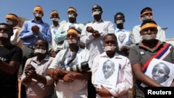 Somali journalists, in Mogadishu on Jan. 27, 2013, demand the release of Abdiaziz Abdinur Ibrahim, who was arrested after reporting on an alleged rape case involving government soldiers. 