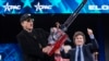 FILE - Elon Musk, left, receives a chain saw from Argentina's President Javier Milei at the Conservative Political Action Conference, CPAC, at the Gaylord National Resort & Convention Center, in Oxon Hill, Maryland, Feb. 20, 2025.