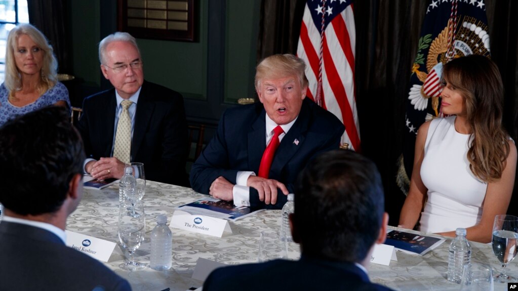 President Donald Trump speaks during a briefing on the opioid crisis, Aug. 8, 2017, at Trump National Golf Club in Bedminster, N.J. From left are, White House senior adviser Kellyanne Conway, Health and Human Services Secretary Tom Price, Trump, and first