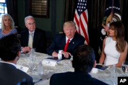 President Donald Trump speaks during a briefing on the opioid crisis, Aug. 8, 2017, at Trump National Golf Club in Bedminster, N.J. From left are, White House senior adviser Kellyanne Conway, Health and Human Services Secretary Tom Price, Trump, and first